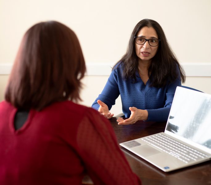 A carer receives one-to-one support from a Carers Support staff member