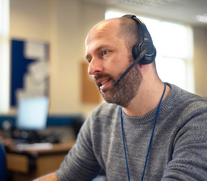 A Carers Support staff member taking a CarersLine call