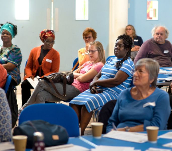 A group of carers attending a training course