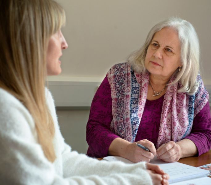 A carer talks to a Carers Support Officer