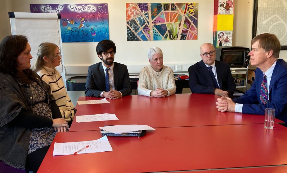 Group of people around table