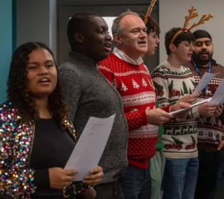 Ed Davey singing with our young carers