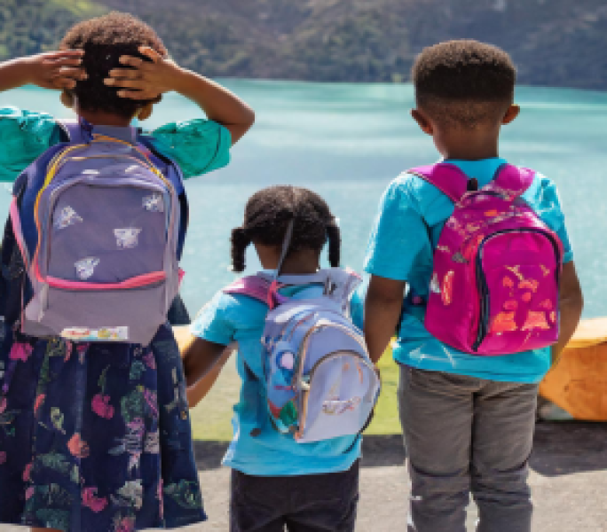 Young carer Laila with her brother and sister